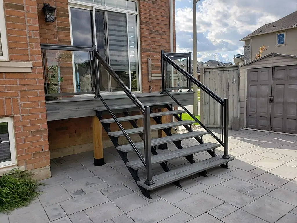 Aluminum and glass exterior railing installation on a West GTA home — clean lines and safe stairs