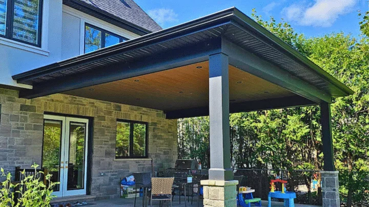 Wood like soffit on the ceiling, black soffit and eavestrough