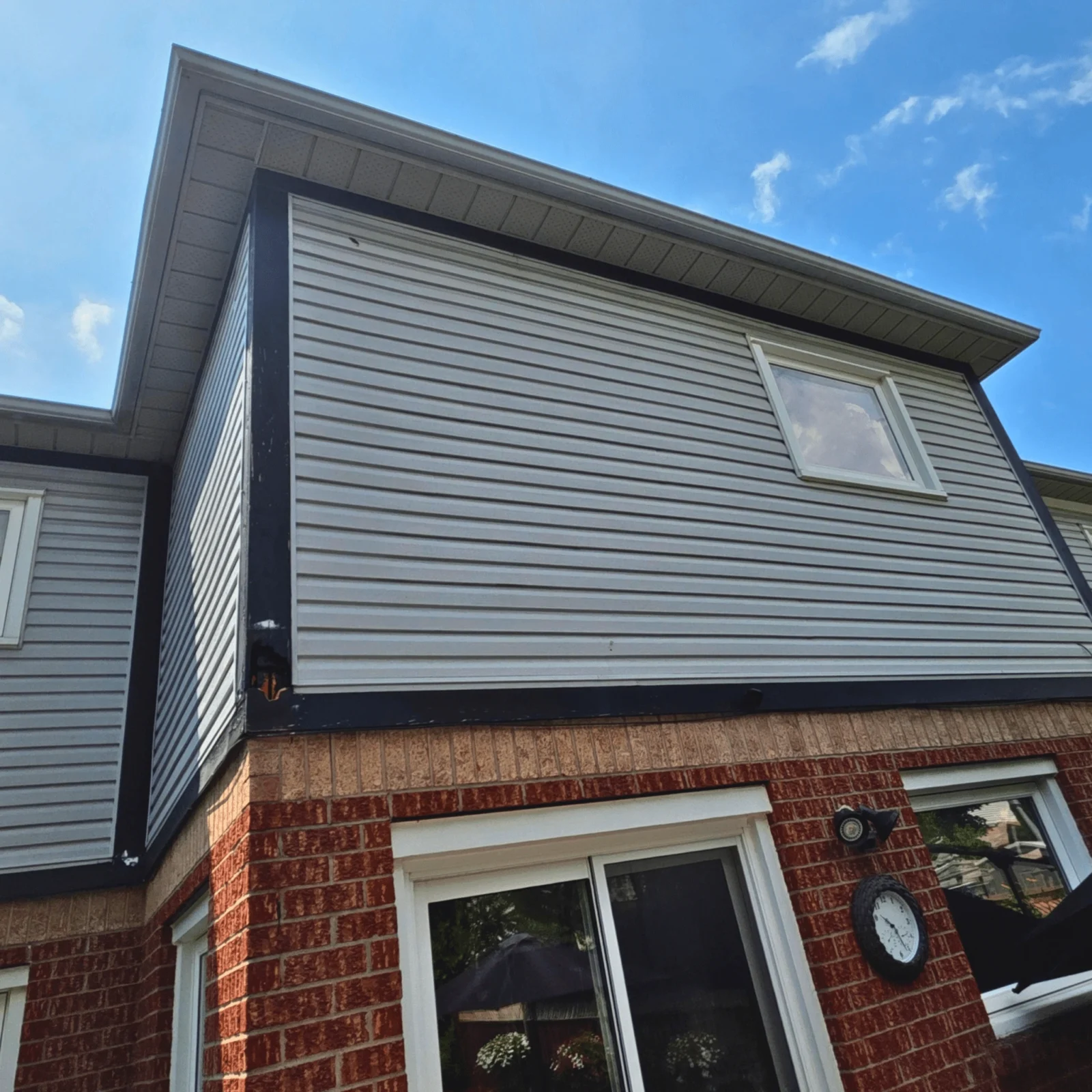 Full soffit, fascia, siding, gutter replacement in Oakville | Maxima Aluminum LTD (before image )