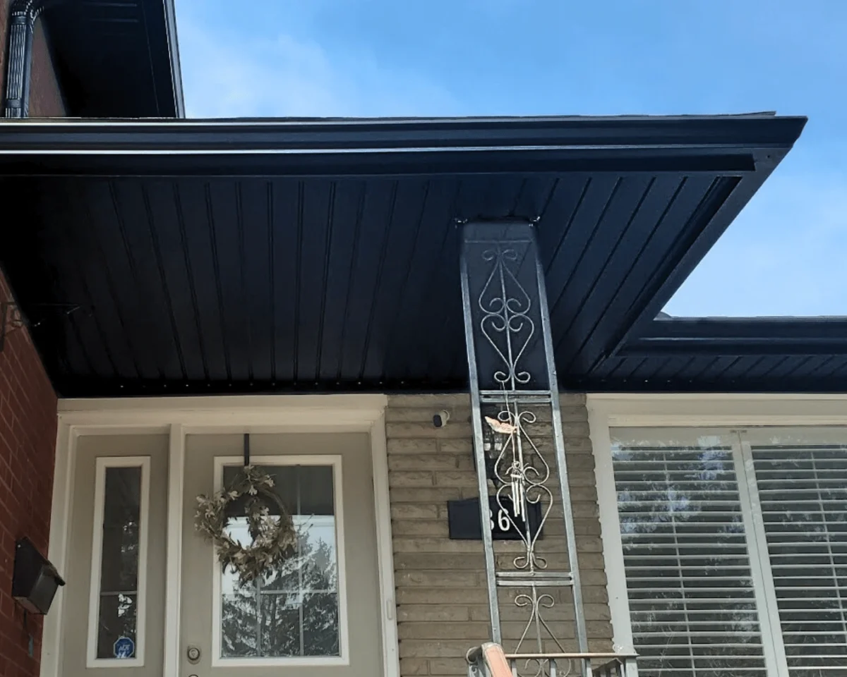 After image, Property in Mississauga, New black soffit, fascia and eavestrough with downspouts