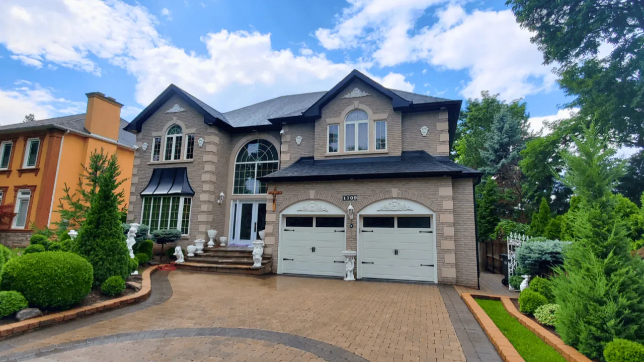 Vented aluminum soffit installation on a Mississauga home — matching fascia and tight trim details by Maxima Aluminum
